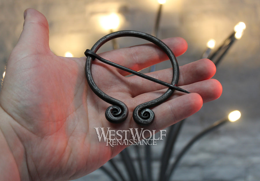 Hand-Forged Steel Pennanular Brooch with Curled Spiral Terminals