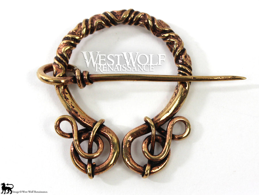 Bronze Penannular Brooch with Twists and Curls