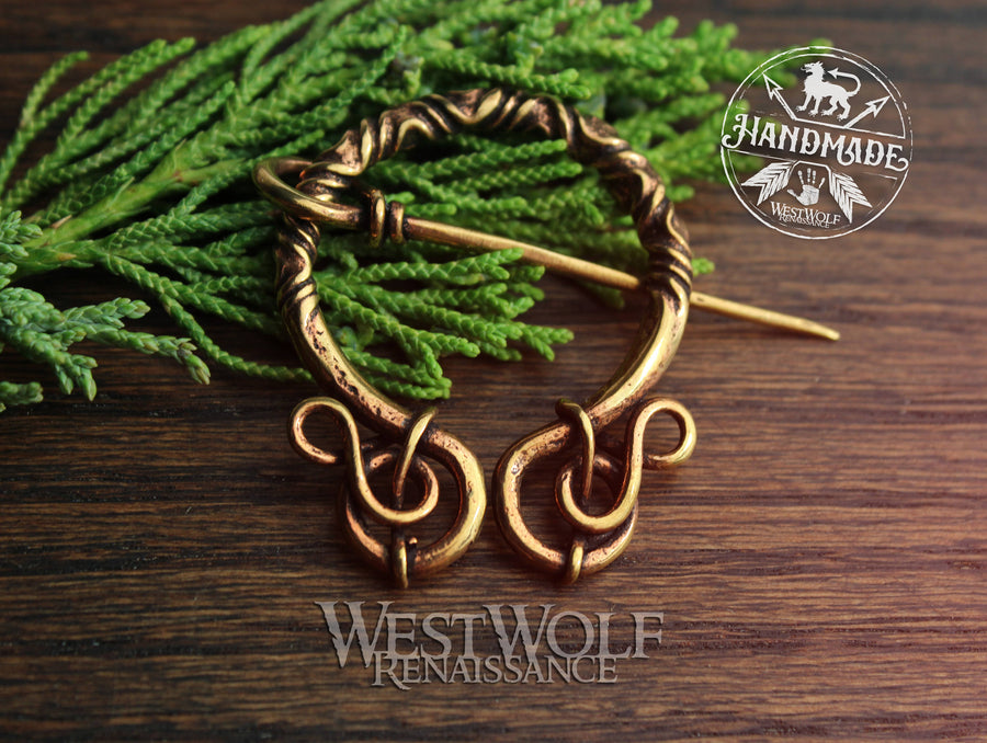Bronze Penannular Brooch with Twists and Curls