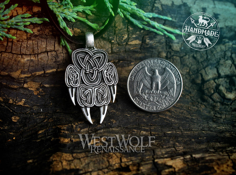 Wolf Paw Pendant with Triquetra Knotwork Design